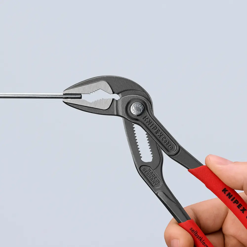 KNIPEX Cobra ES Wasserpumpenzange extra-schlank mit rutschhemmendem Kunststoff grau atramentiert 180 mm